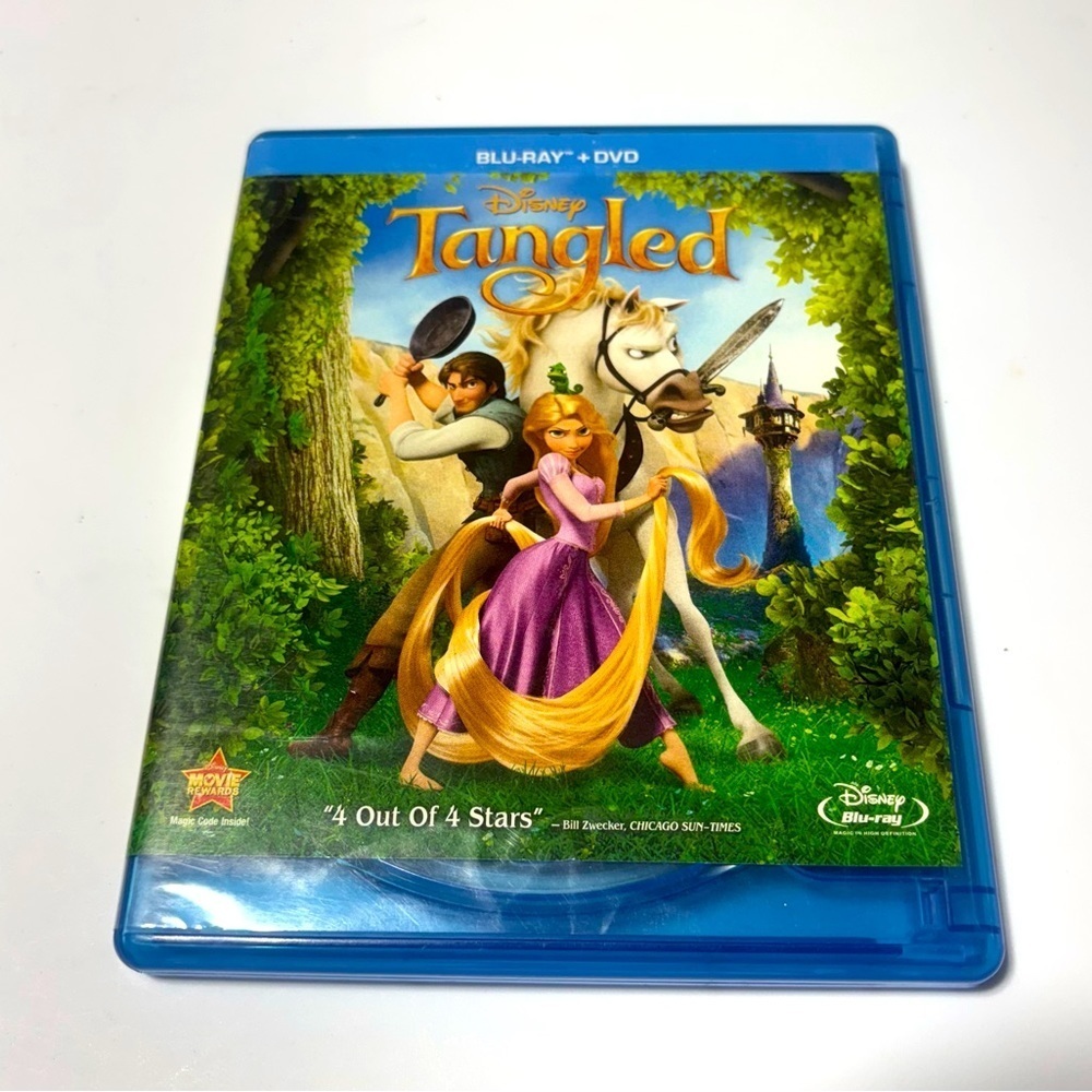 Tangled DVD ONLY! Blu-ray and DVD case of Disney's animated movie "Tangled".